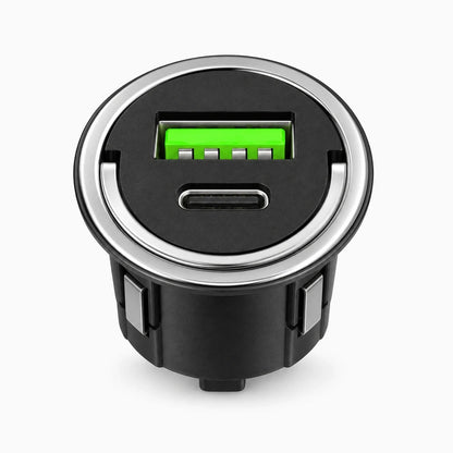 Petit adaptateur charge rapide noir mat rangé dans boîte à gants voiture