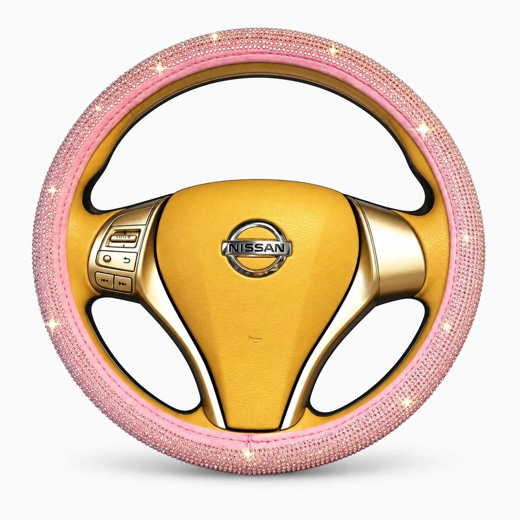 Détail des incrustations de strass du couvre volant rose brillant
